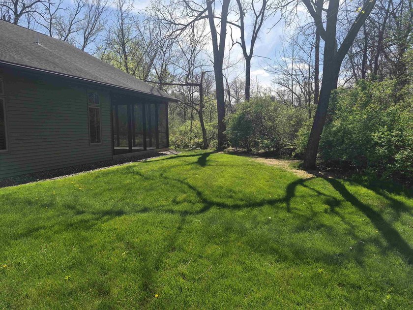 GORGEOUS COUNTRY FREE STANDING CONDO ON WOODED LOT W/WATER - photo 47