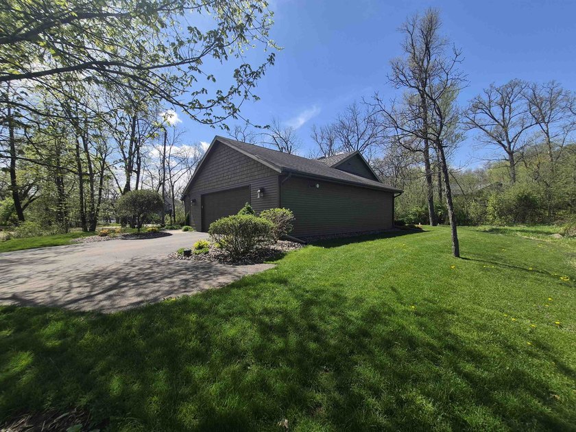 GORGEOUS COUNTRY FREE STANDING CONDO ON WOODED LOT W/WATER - photo 50