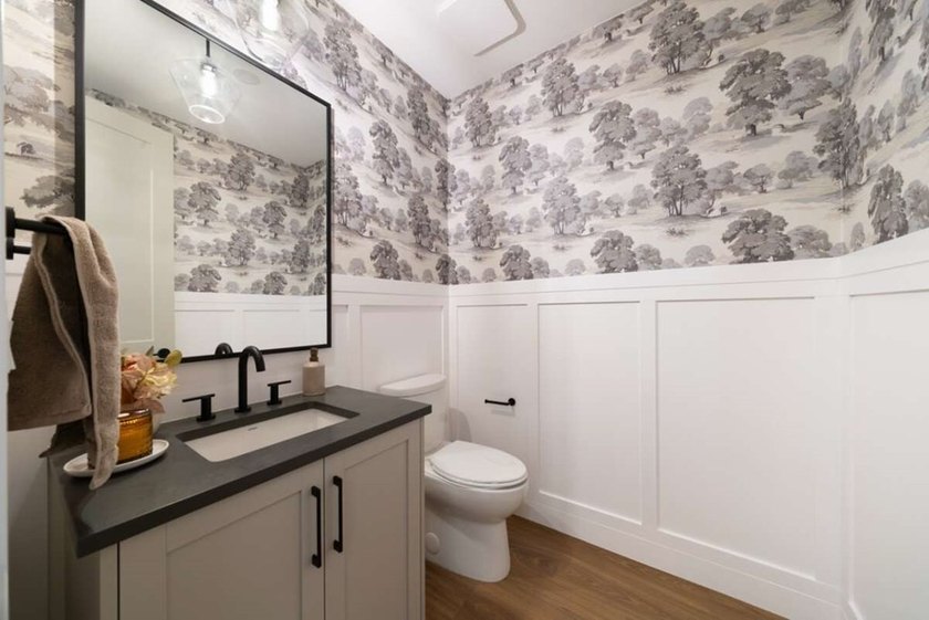 This thoughtfully designed 3-bedroom, 2.5-bath home offers the - photo 22