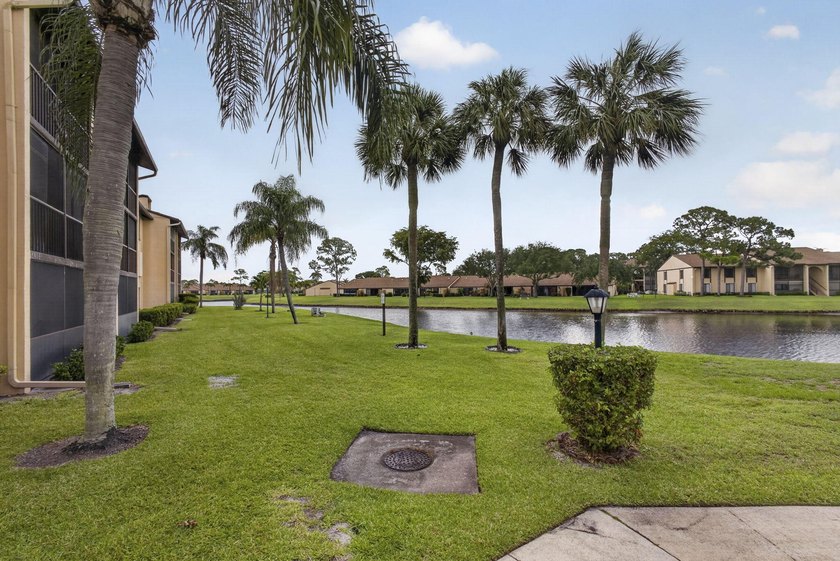 Enjoy peaceful lake views from this condo w/ living/dining room - photo 7