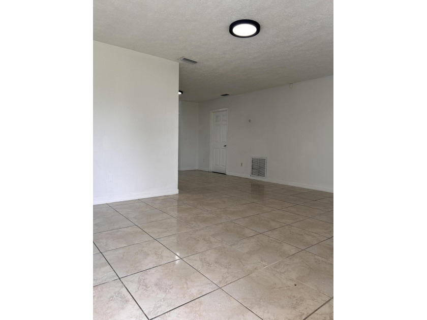Wonderful pool home situated on a spacious corner lot. This - photo 2