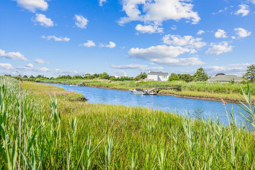 Discover a charming waterfront haven at 27 Jagger Lane in - photo 11