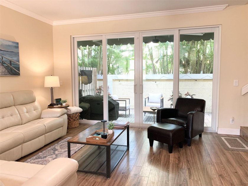 Located in an upscale, relaxed, coastal beach town of East - photo 15