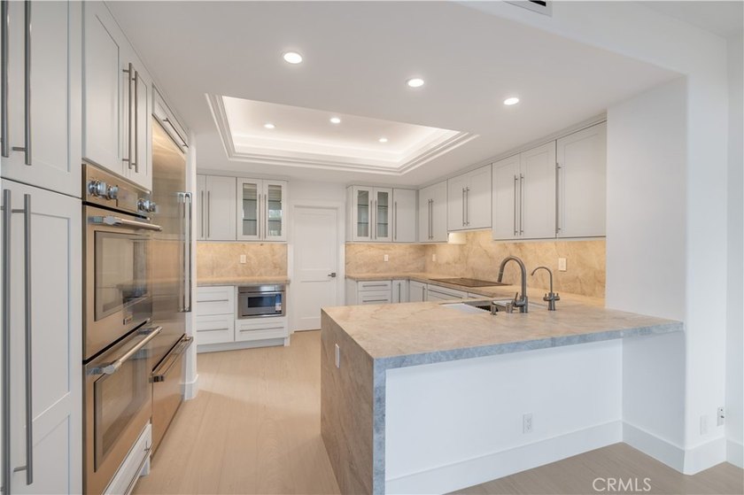 Set within the gated and private community of Belcourt, this - photo 4