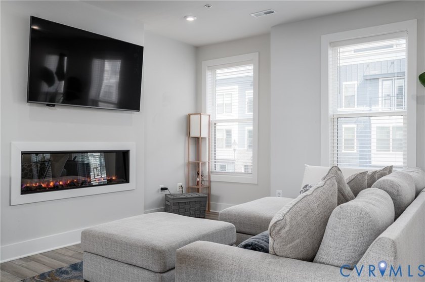 Experience elevated city living in this exceptional modern 3 Bed - photo 7