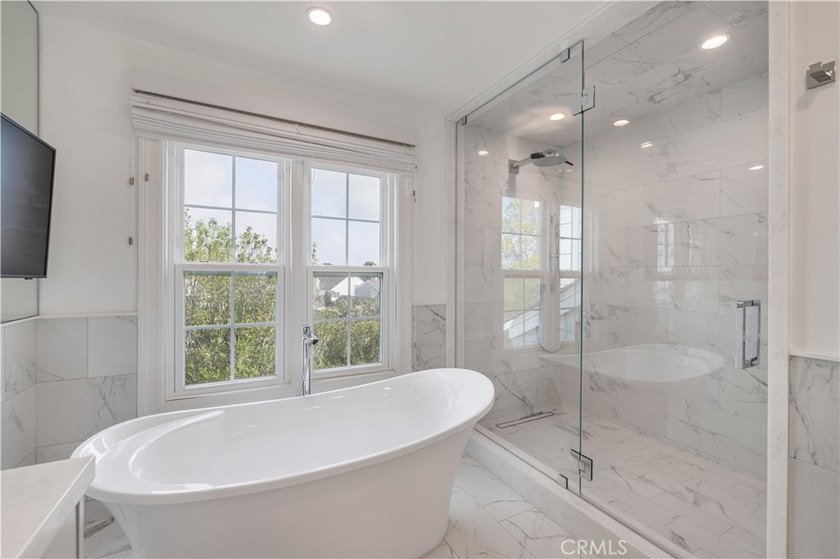 Set within the gated and private community of Belcourt, this - photo 10