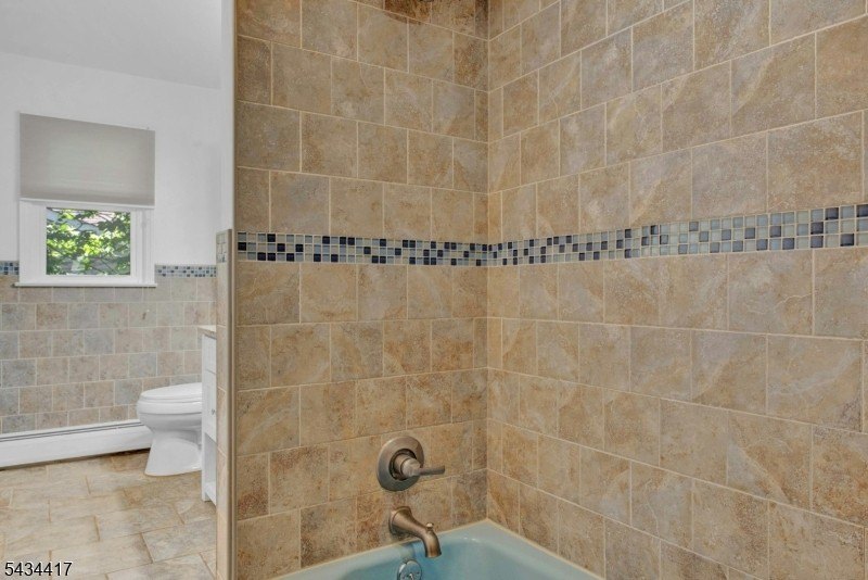 Welcome to Packanack Lake, where lifestyle meets location! This - photo 17