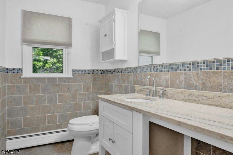 Welcome to Packanack Lake, where lifestyle meets location! This - photo 18