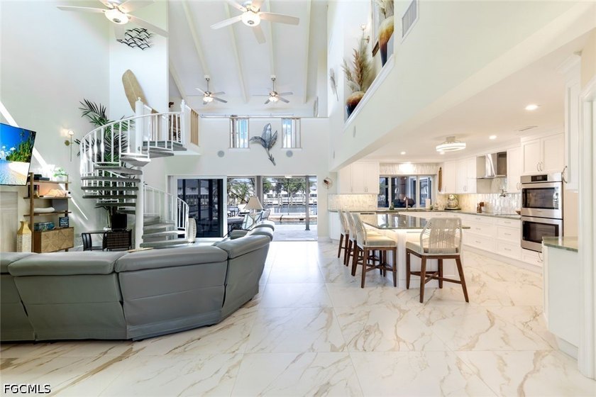 Stepping into this home, you're immediately welcomed by a bright - photo 9