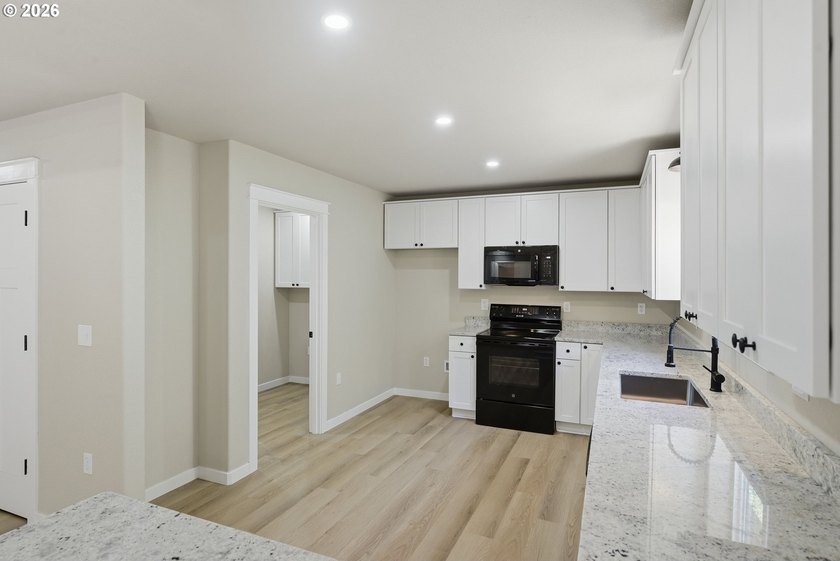 Completely rebuilt from the studs up, this beautifully remodeled - photo 11