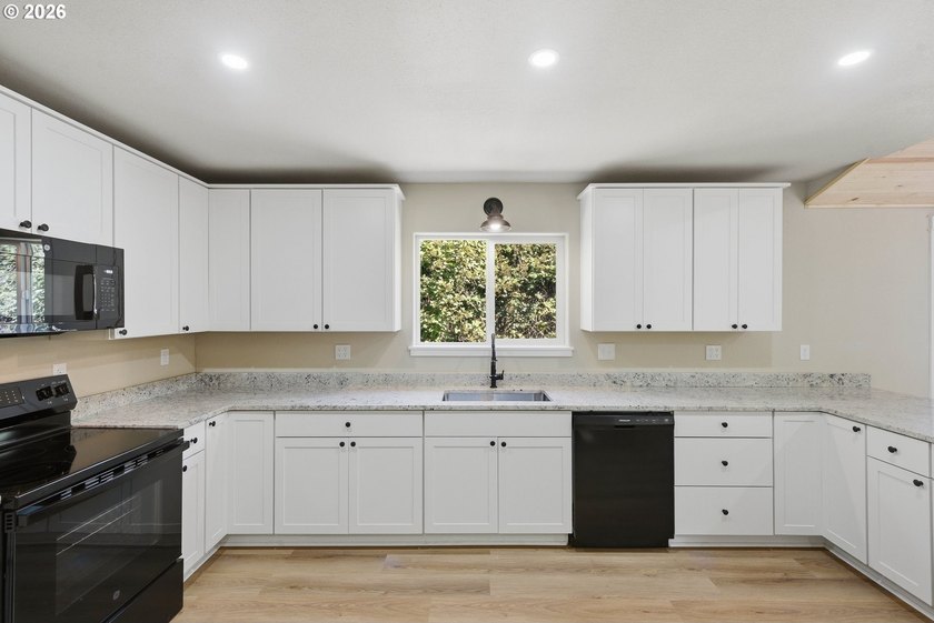 Completely rebuilt from the studs up, this beautifully remodeled - photo 14