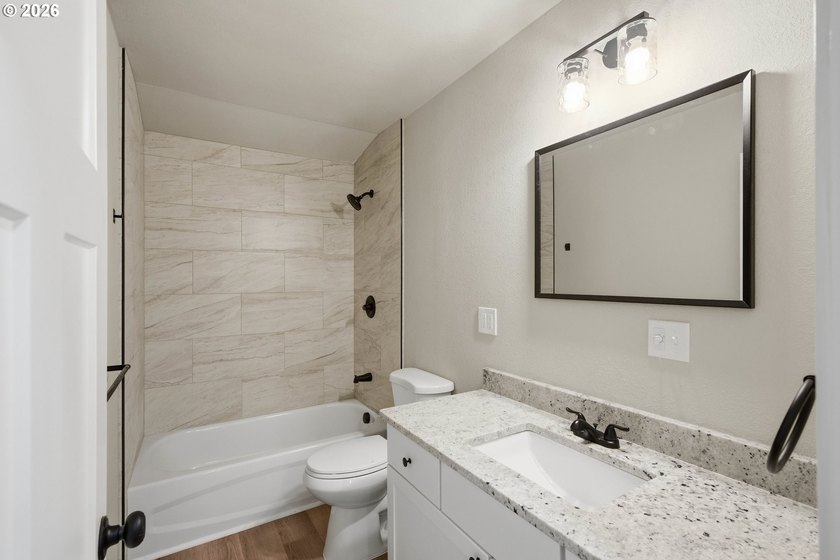 Completely rebuilt from the studs up, this beautifully remodeled - photo 17