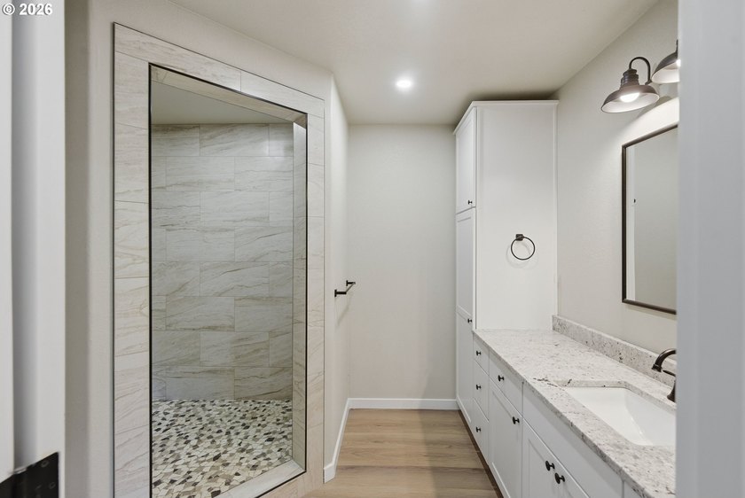 Completely rebuilt from the studs up, this beautifully remodeled - photo 25