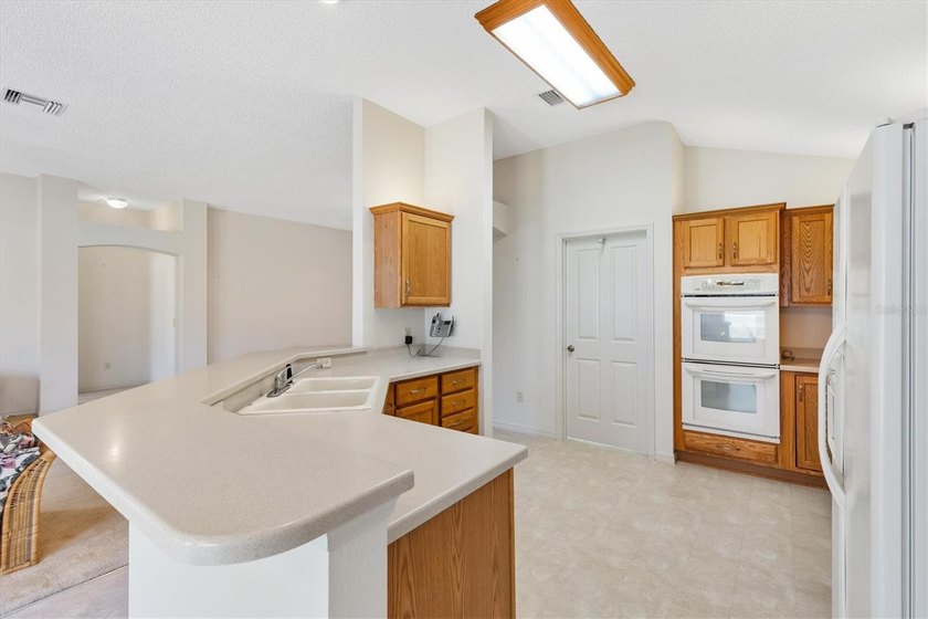 PRICE IMPROVEMENT!!! THIS CUSTOM-BUILT HOME has been extended - photo 10