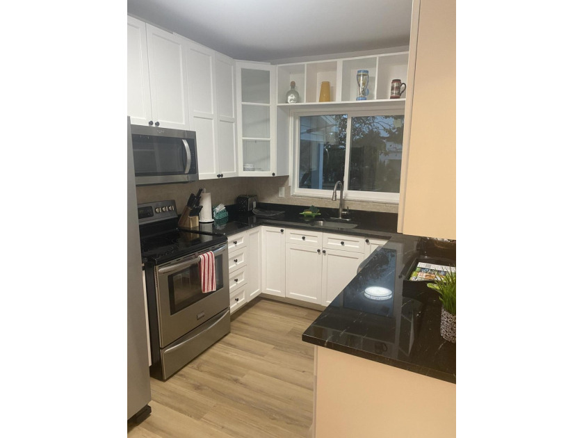 Come see this charming and nicely renovated single family home - photo 6