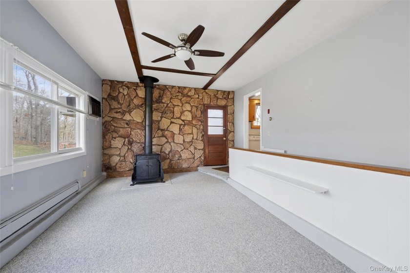 This lovely Hampton Bays residence sits on .47 acres and offers - photo 20