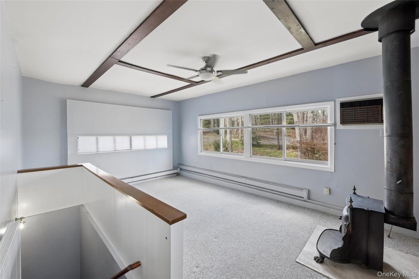 This lovely Hampton Bays residence sits on .47 acres and offers - photo 36