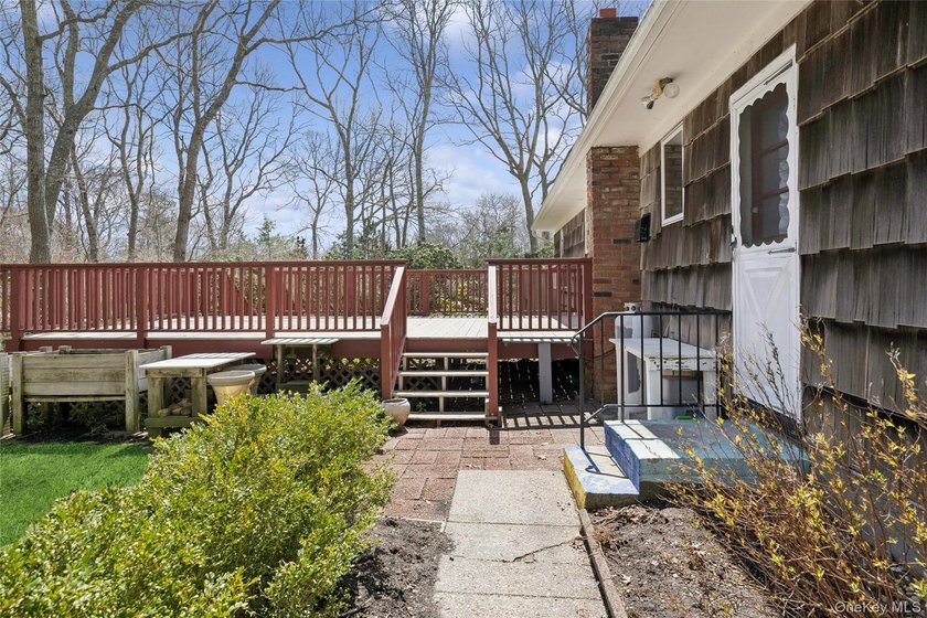 This lovely Hampton Bays residence sits on .47 acres and offers - photo 39