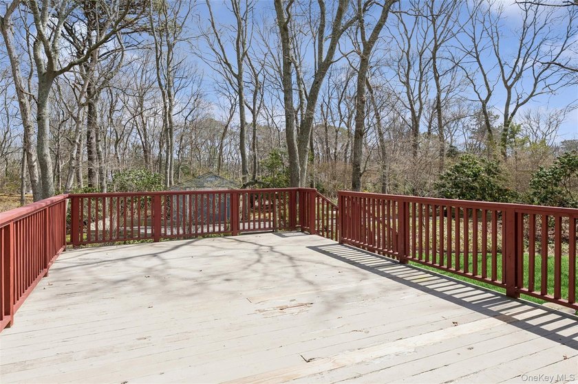 This lovely Hampton Bays residence sits on .47 acres and offers - photo 40