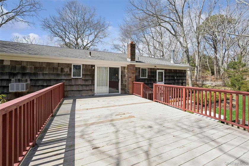 This lovely Hampton Bays residence sits on .47 acres and offers - photo 41