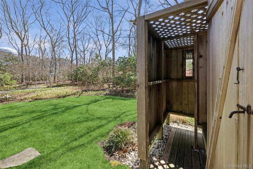 This lovely Hampton Bays residence sits on .47 acres and offers - photo 44