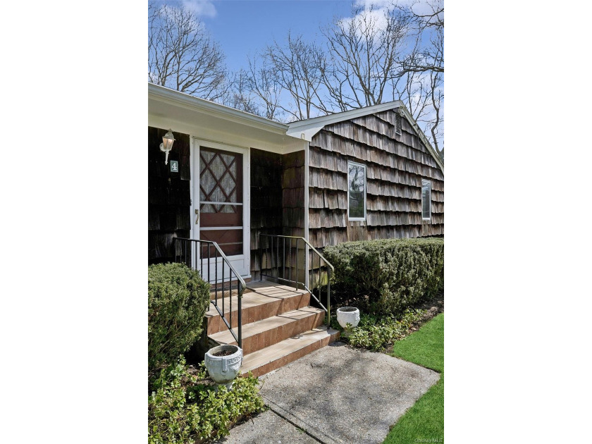 This lovely Hampton Bays residence sits on .47 acres and offers - photo 45