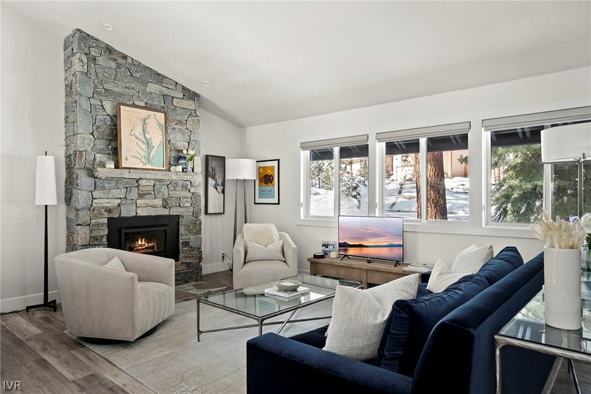 Welcome to this exquisitely remodeled home where convenience - photo 3
