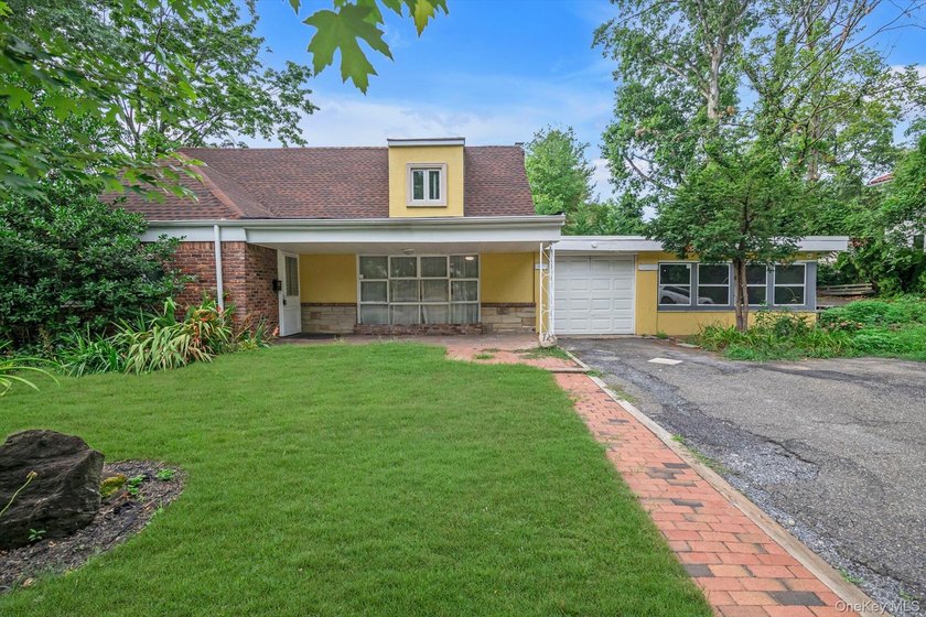 Welcome to this Great Potential Expanded Ranch in the Heart of - photo 2