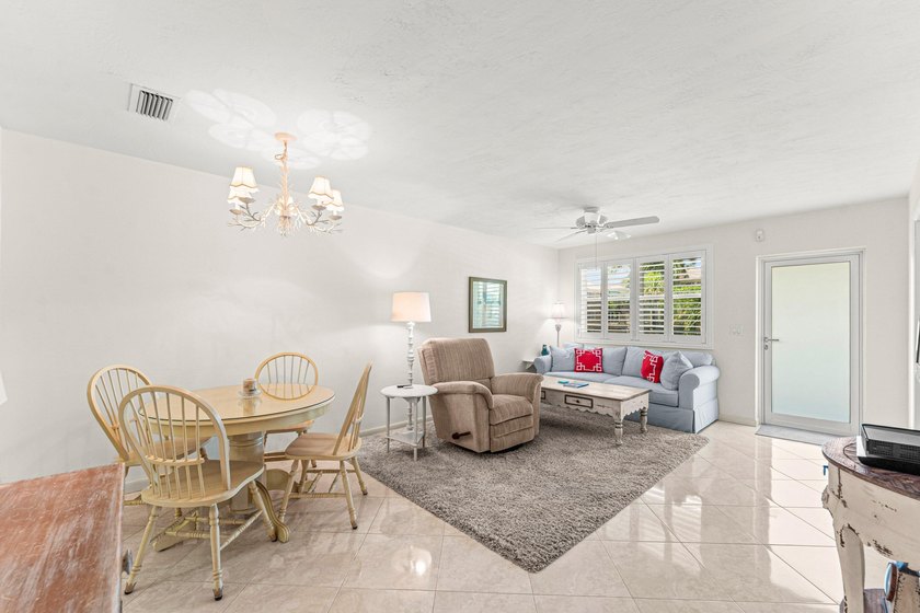 Location truly is everything. Just steps from the beach, this - photo 8