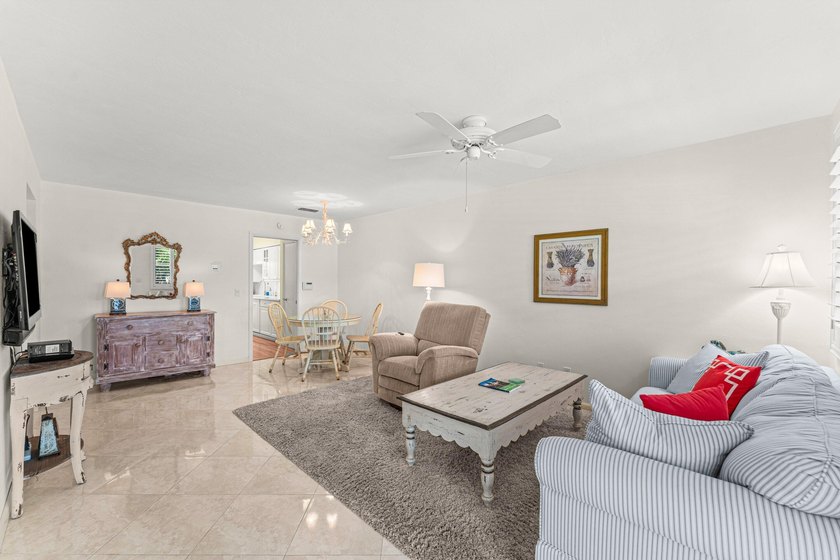 Location truly is everything. Just steps from the beach, this - photo 9