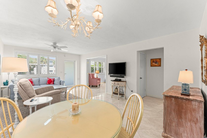 Location truly is everything. Just steps from the beach, this - photo 10