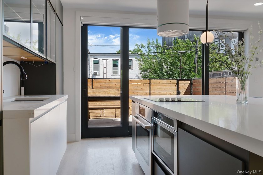 Welcome to 1712 DeKalb Avenue, a fully renovated single-family - photo 5