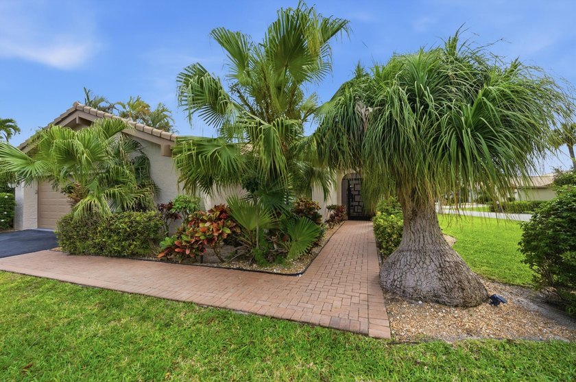 Nestled in the sought-after Villas of Green Glen within the - photo 2