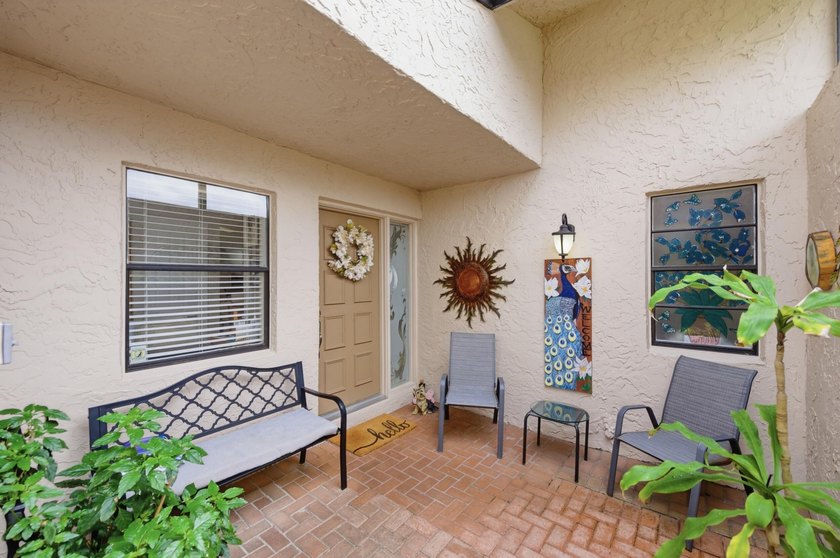 Nestled in the sought-after Villas of Green Glen within the - photo 6