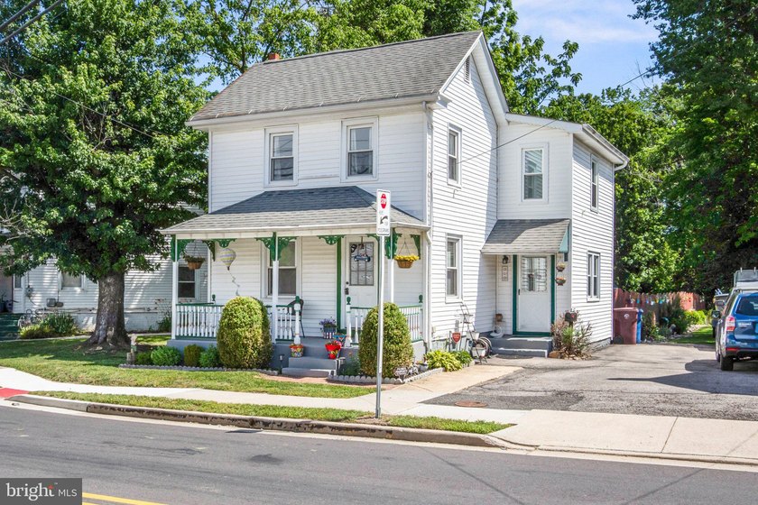 Nestled across the street from Memorial Lake, this charming home - photo 3