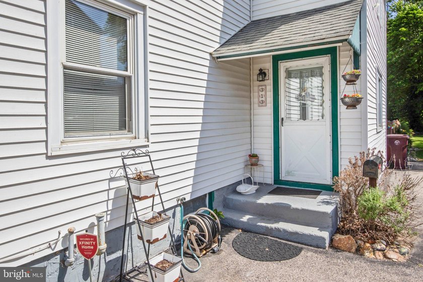 Nestled across the street from Memorial Lake, this charming home - photo 6