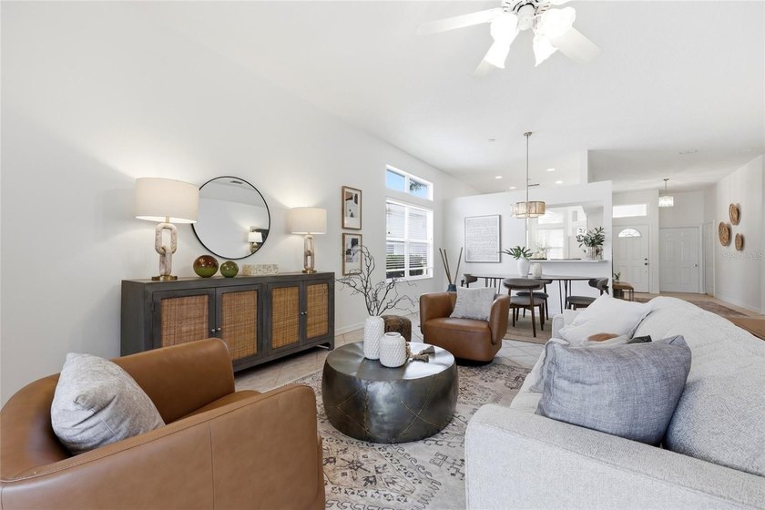 Welcome to easy coastal living in the highly sought-after gated - photo 5