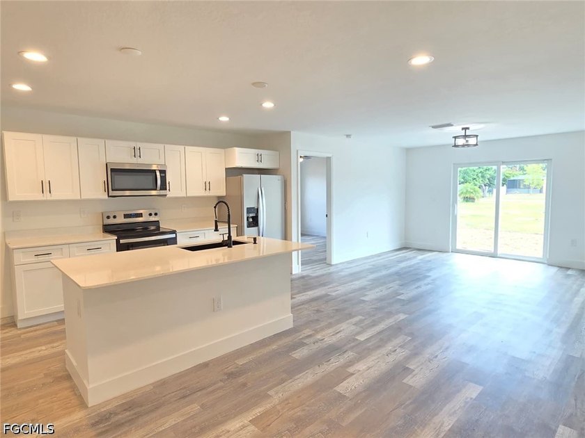 New construction corner lot 3-bedroom, 2-bath home with a 2-car - photo 4