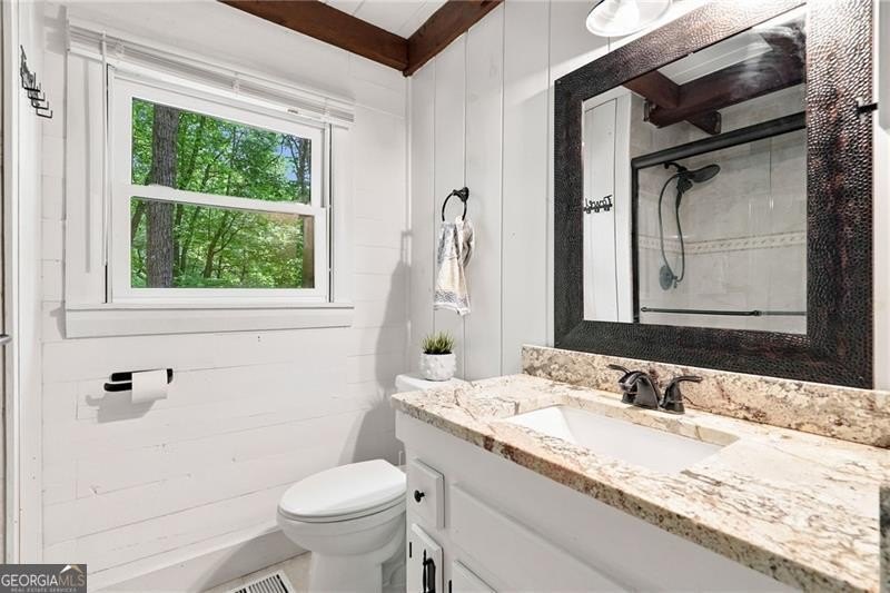 This light and bright 4 BR with 2 Full Bath design home is a - photo 15