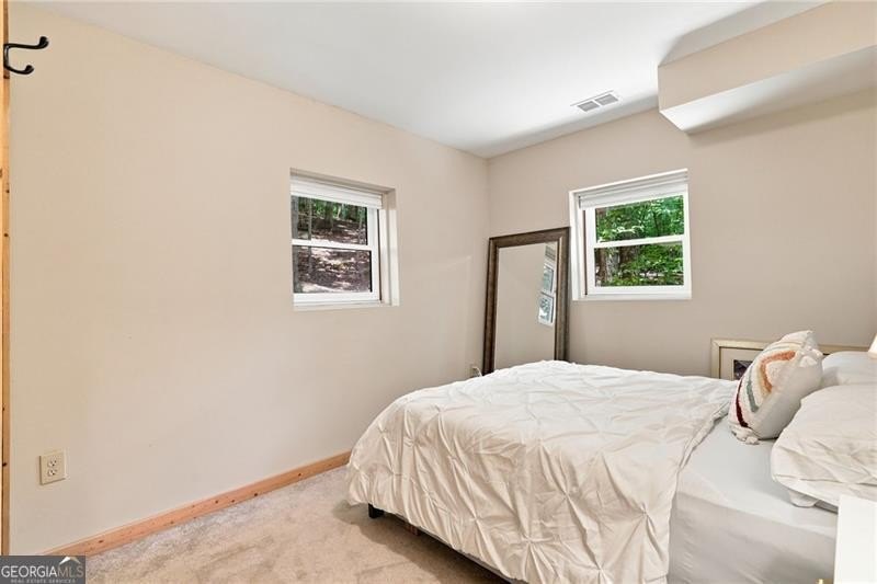 This light and bright 4 BR with 2 Full Bath design home is a - photo 25