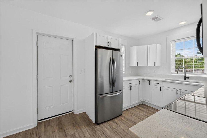 This charming 3-bedroom, 2-bath home has been completely - photo 9