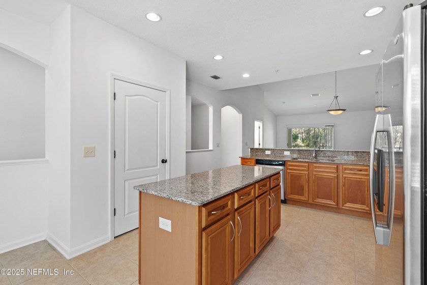 Welcome home to this move-in-ready 3-bedroom, 2-bath condo with - photo 11