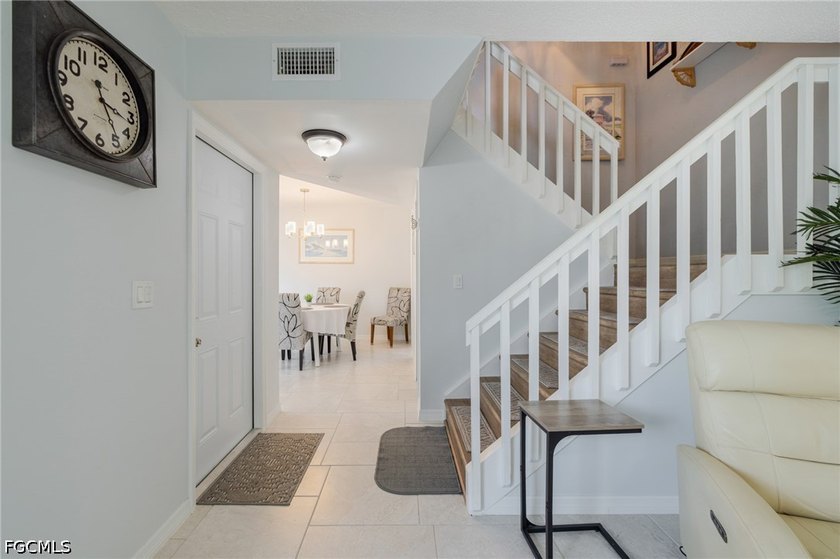 Step into this beautifully maintained townhouse in desirable - photo 2