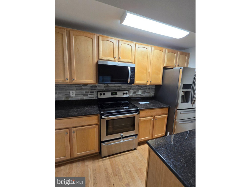 Discover the charm of Penderbrook Square Condominiums, where - photo 17