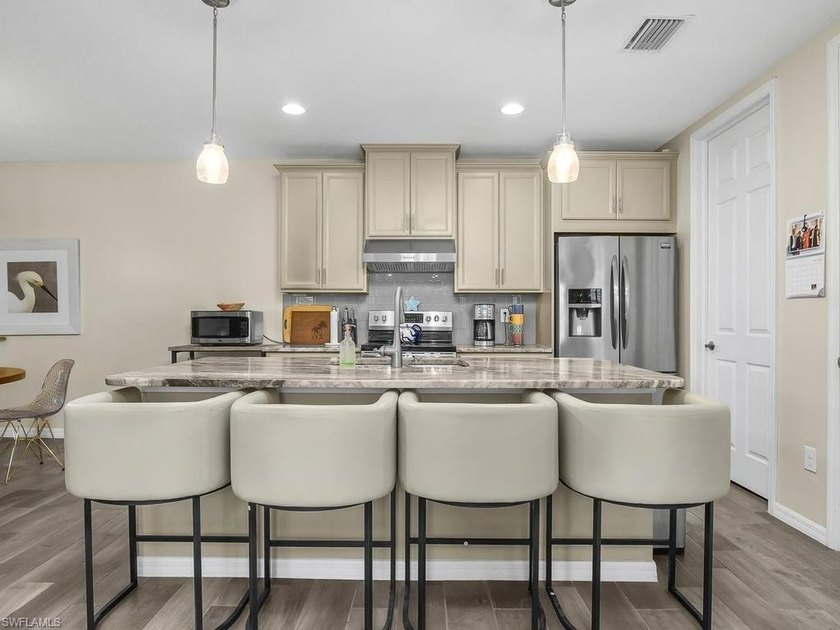 Experience elevated coastal living in the highly sought-after - photo 4
