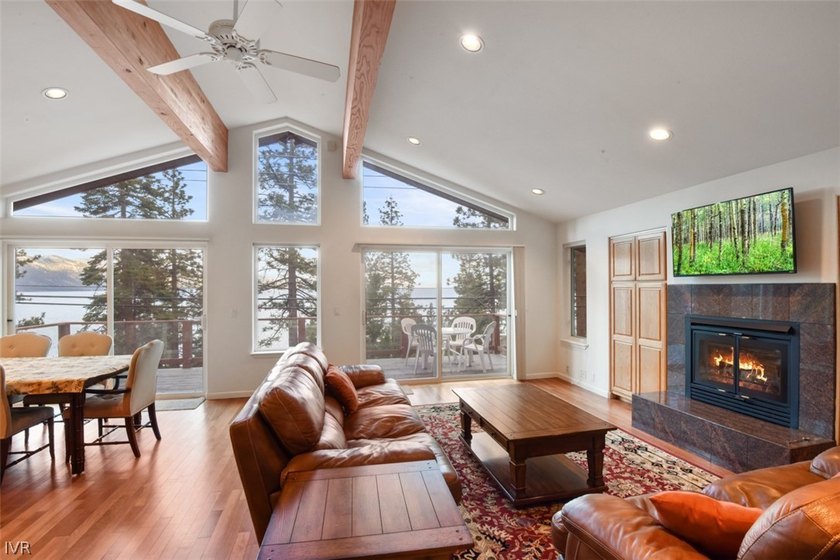 Perched above the sparkling waters of Lake Tahoe in the gated - photo 3