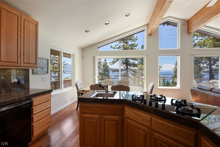 Perched above the sparkling waters of Lake Tahoe in the gated - photo 8