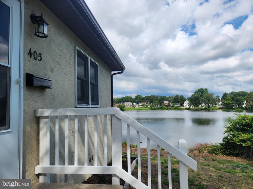 Nestled on the serene banks of Johnson Pond, this charming - photo 5