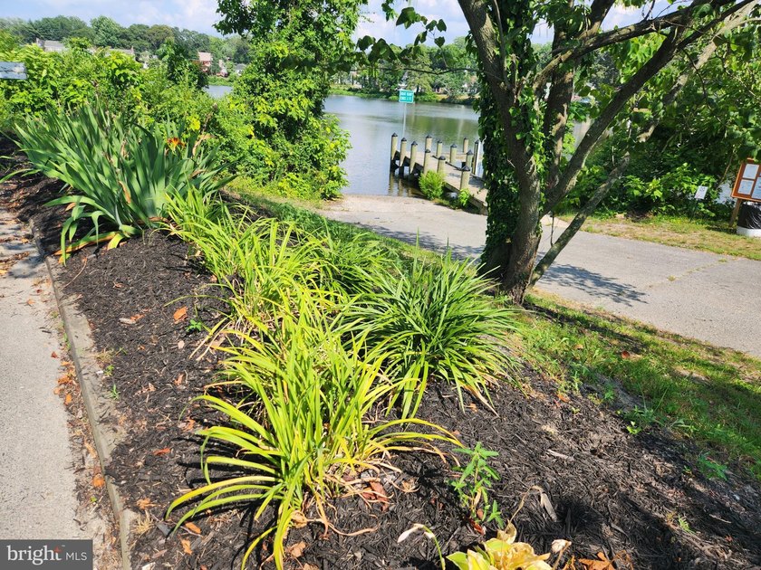 Nestled on the serene banks of Johnson Pond, this charming - photo 10