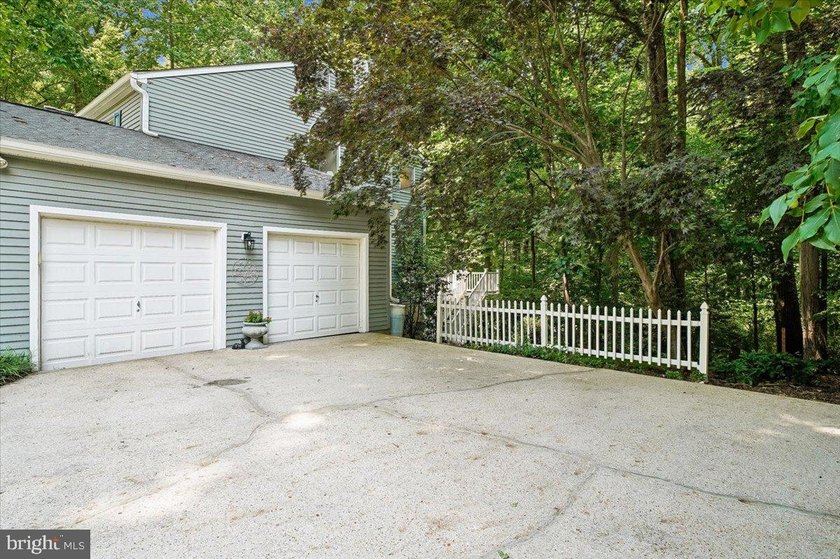 Tucked away on a quiet, wooded homesite, this beautiful 4BR/3 - photo 50